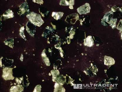 Silicon carbide microparticles contained in Opalustre abrasion slurry. (Photo courtesy of Dr. Renato Herman Sundfeld)